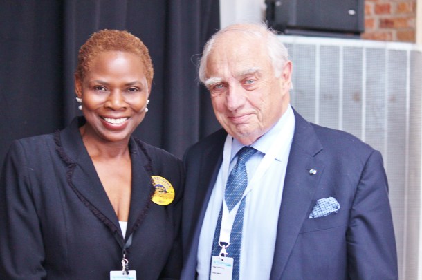 4.Justina Mutale wth Sir Peter Sutherland, United Nations Special Representative of the Secretary-General for Migration, at the Global Forum on Migrations and Development in Stockholm, Sweden (photo by Ingrid Marn)